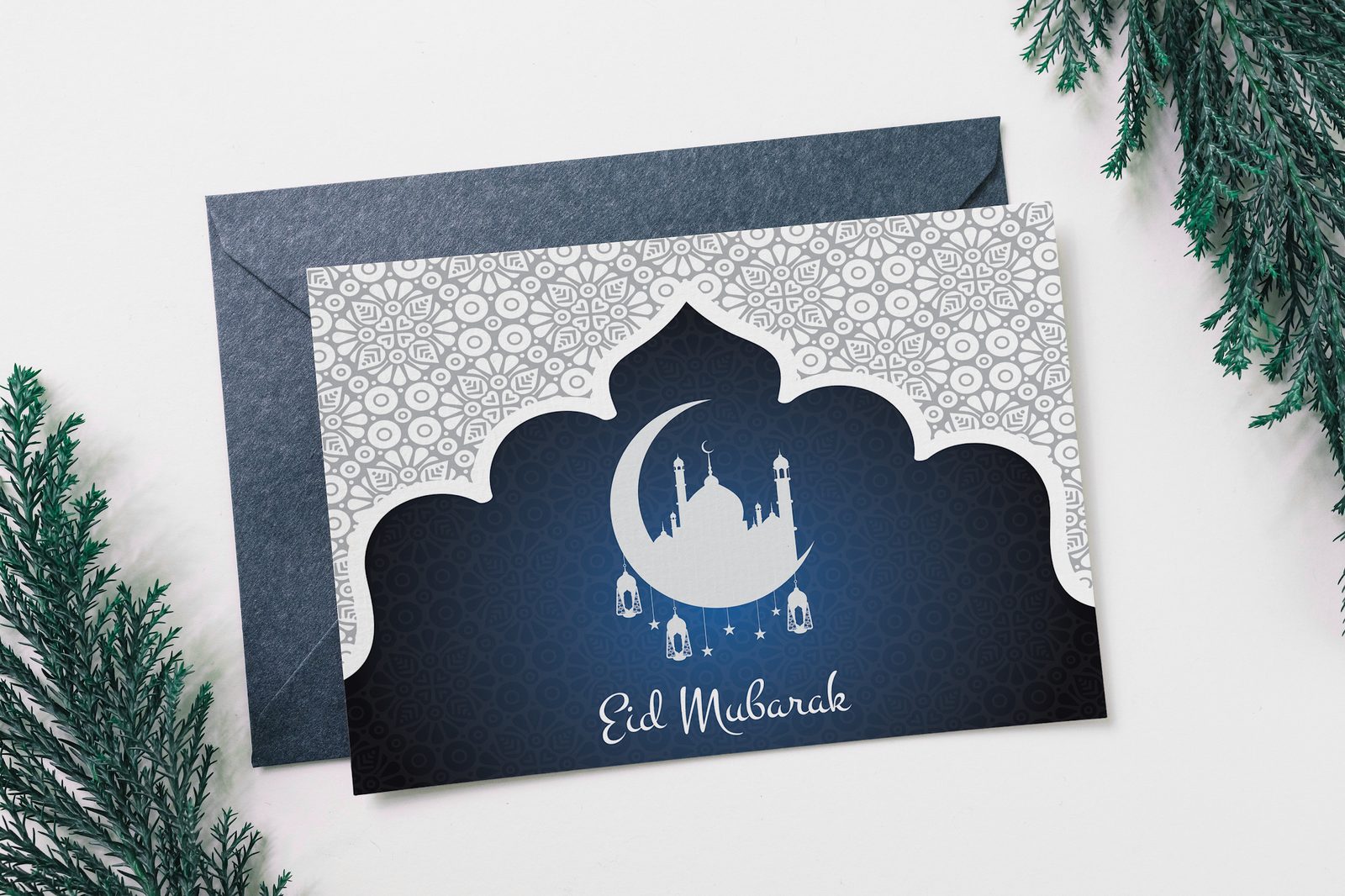Printed Eid greeting card with Arabic lettering and a restrained palette